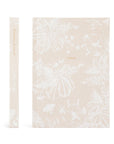 Notebook with white floral pattern on beige cover