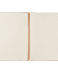 Open notebook with beige pages and a brown binding on a white background
