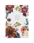 Floral notebook with decorative text on a white background