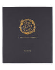 Black book with gold text and design on a white background