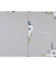 Floral notebook with white flowers on a gray background