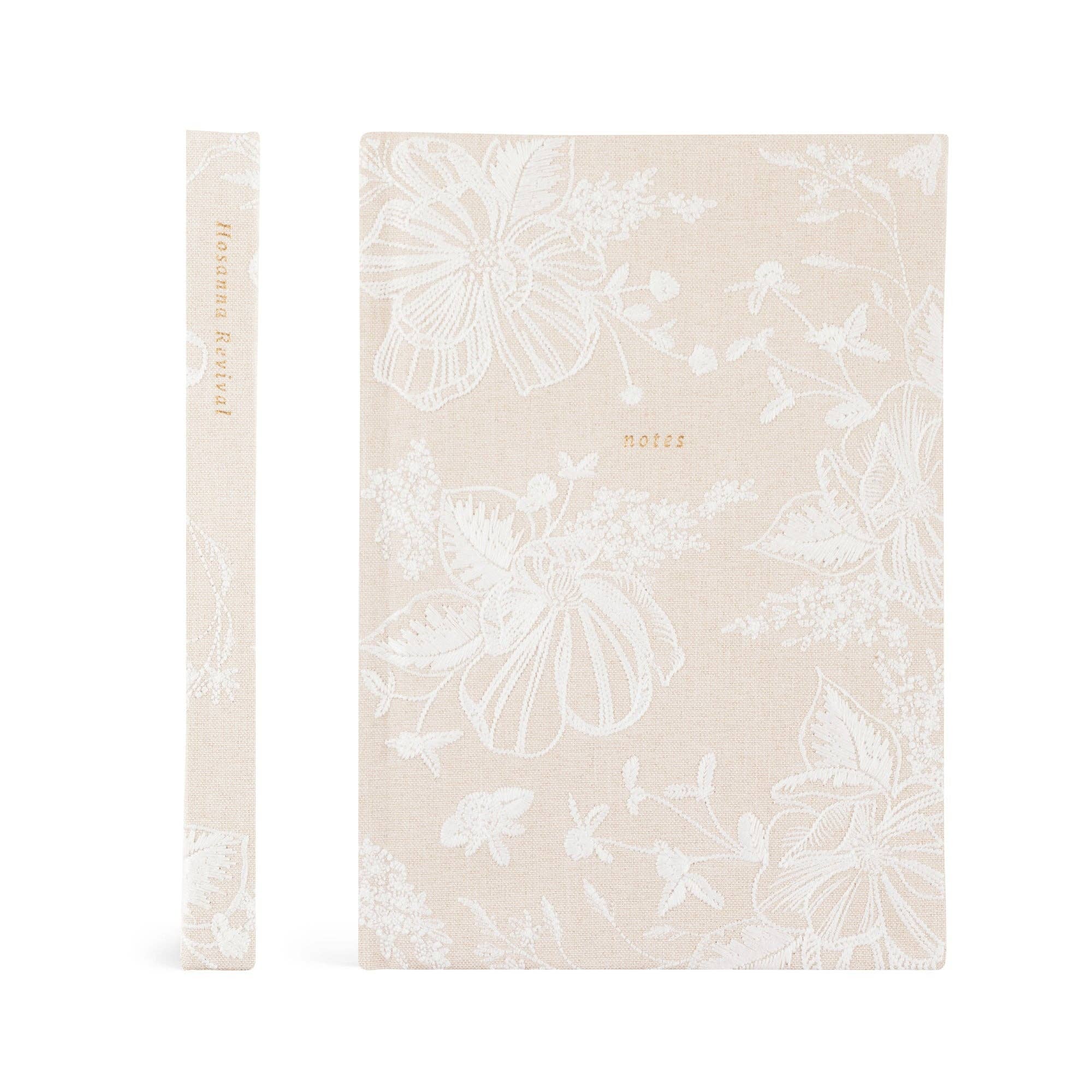 Notebook with white floral pattern on beige cover