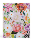 Floral notebook with colorful flowers and 'The Holy Bible' text on a white background