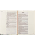 Open book with text on a white background