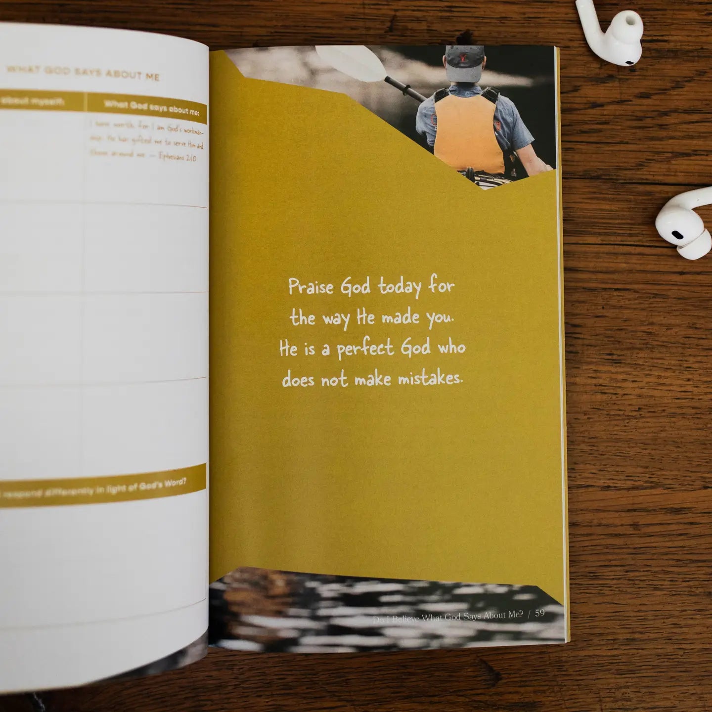 Open book with a yellow page featuring a quote and a photo of a person on a wooden surface.