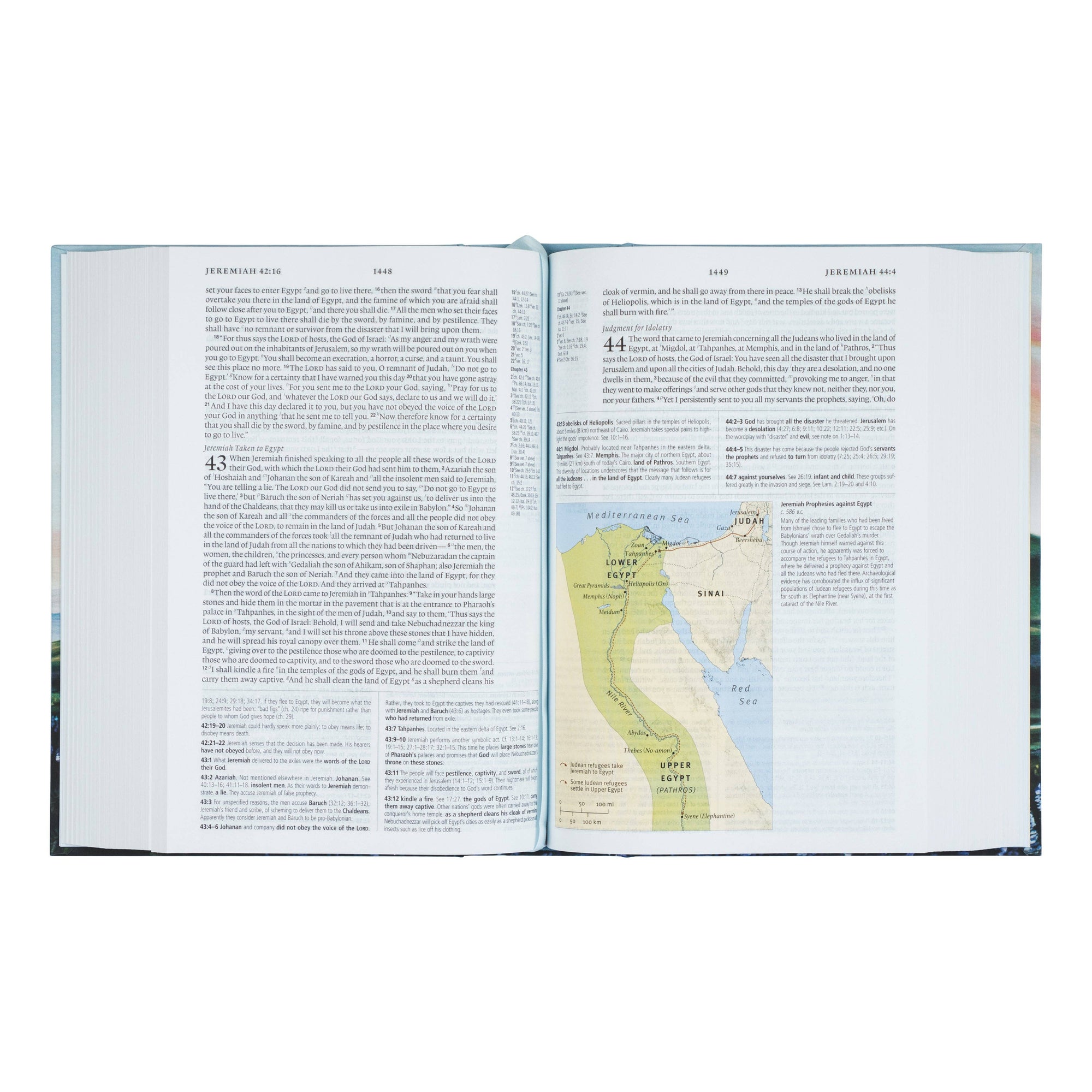 Open book with text and a map on a white background