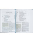 Open book displaying 'The Psalms' with text on a white background