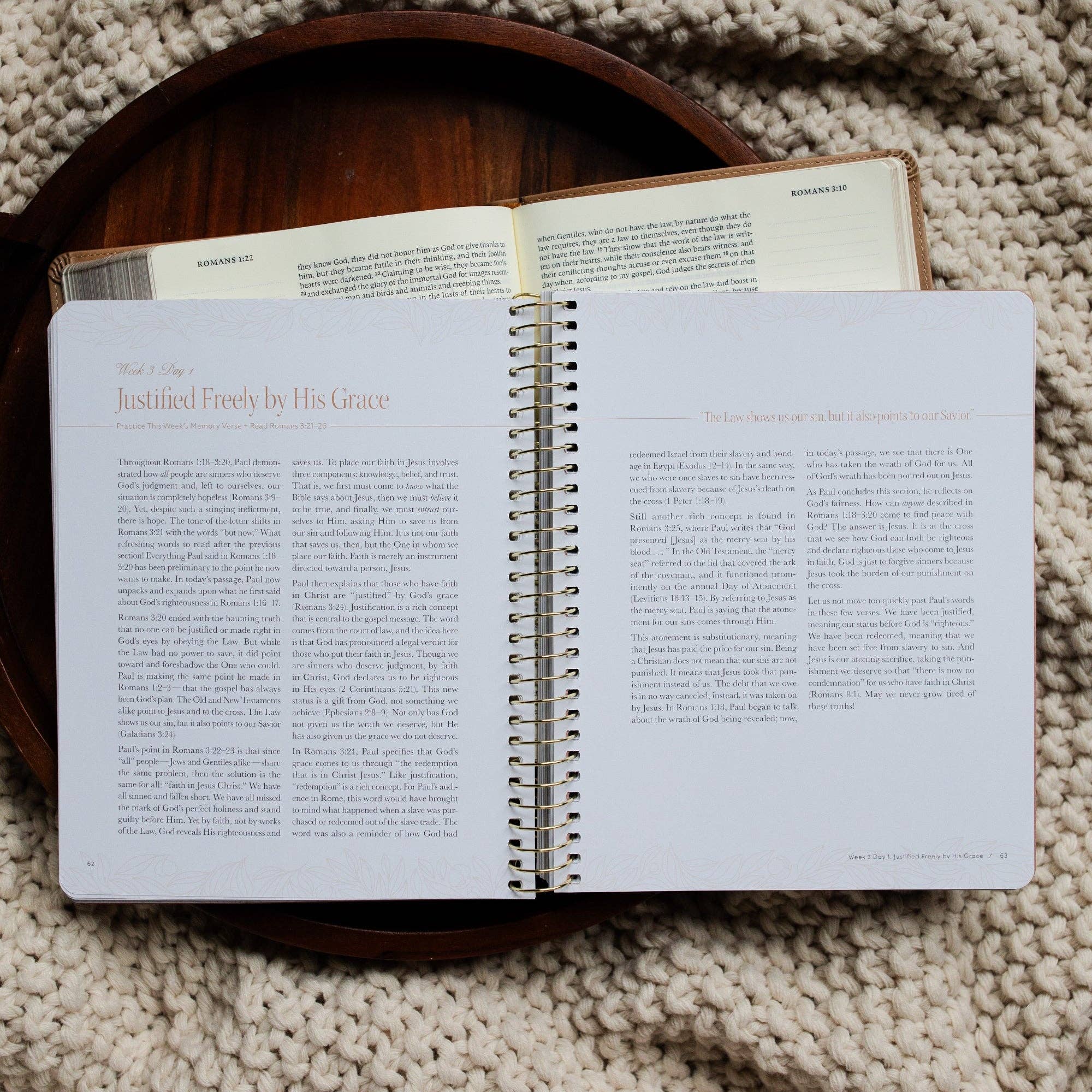 Open book on a textured surface