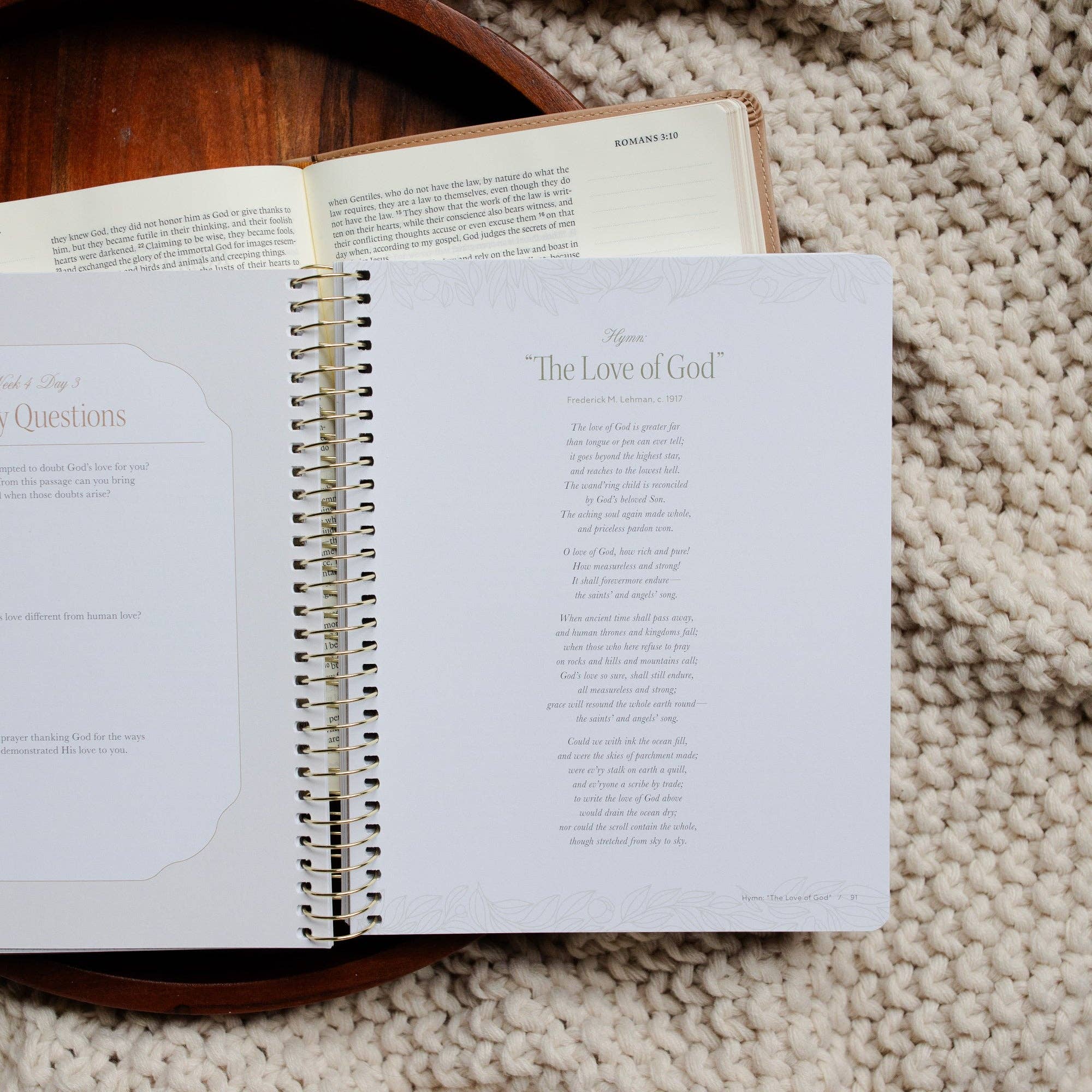Open book on a textured surface with visible text