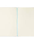 Open notebook with two blank pages and a blue line on a white background