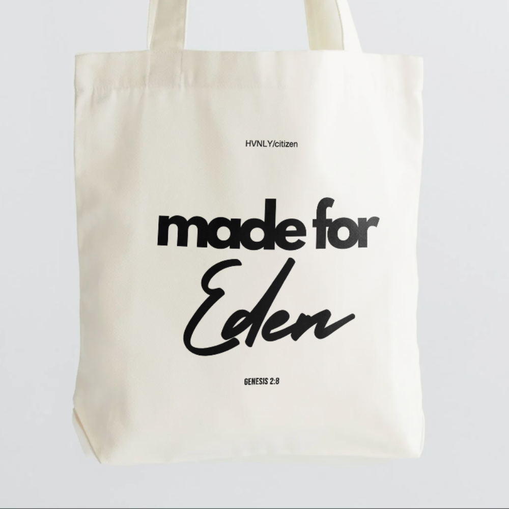 Beige tote bag with 'made for Eden' text on a white background