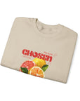 Beige t-shirt with fruit design and text on a white background