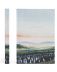 Book cover with a scenic landscape illustration and text on a white background