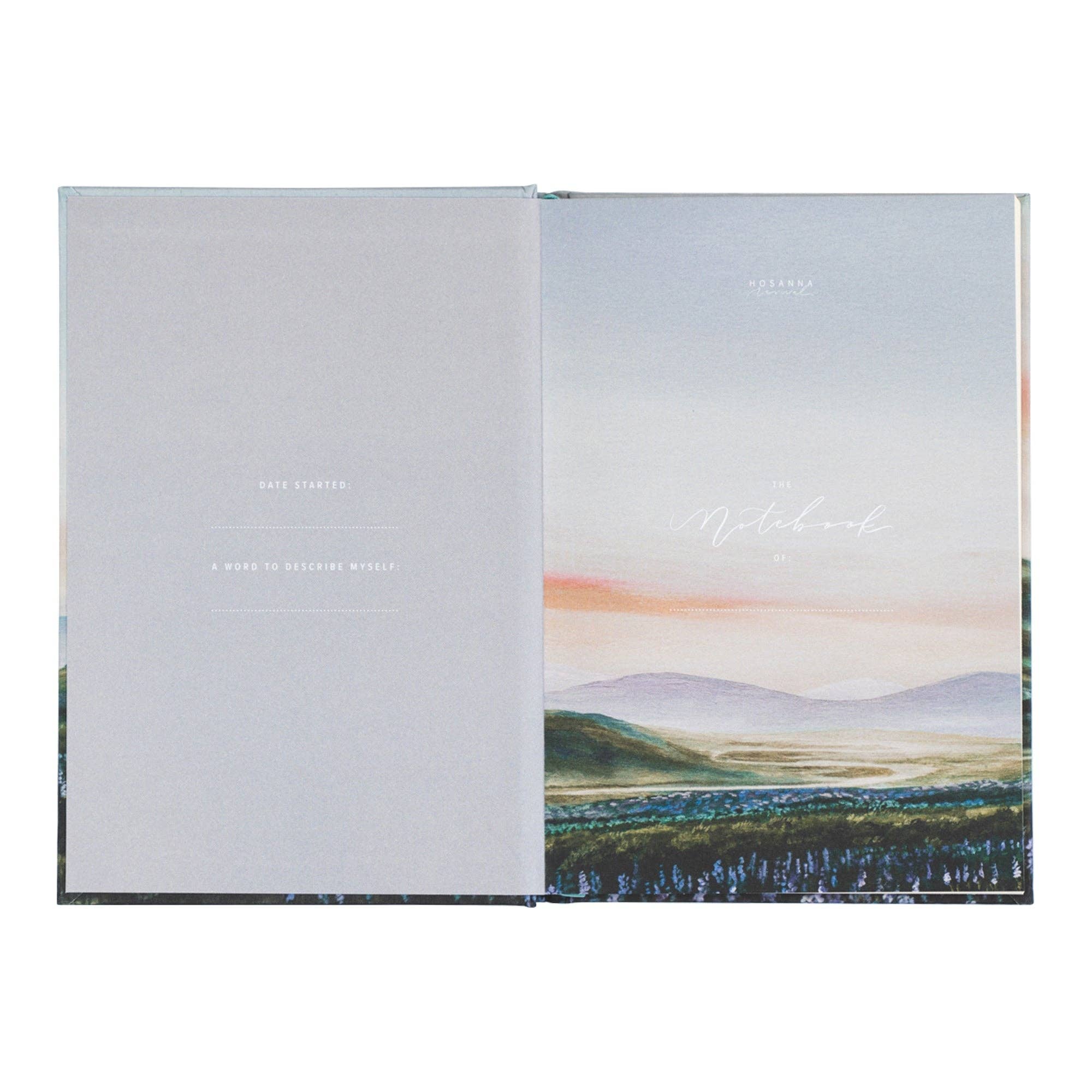 Open notebook with landscape design on the cover