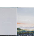 Open notebook with landscape design on the cover