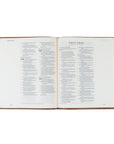 Open book with visible text on a white background
