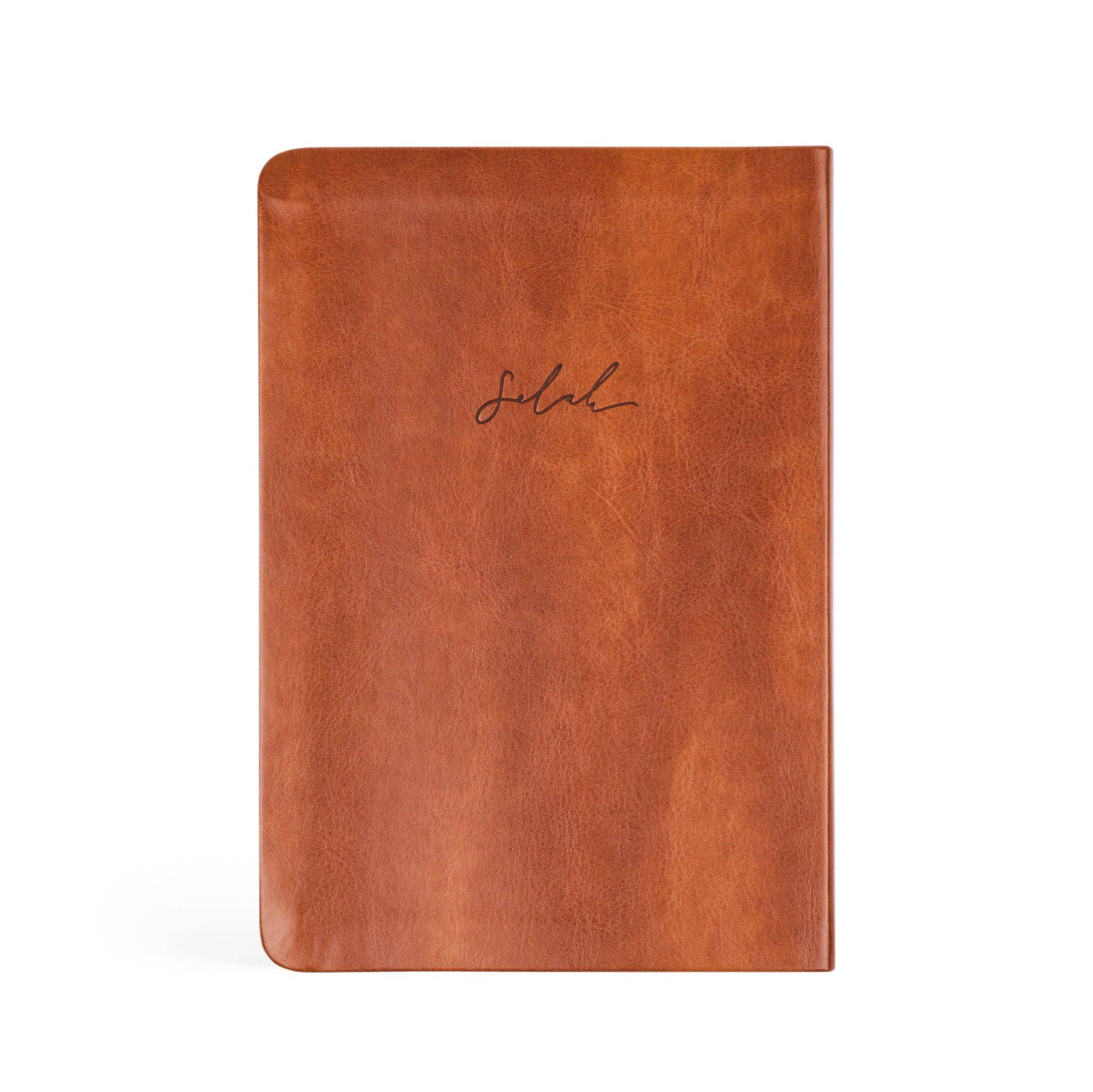 Brown leather notebook with 'Soleh' branding on a white background