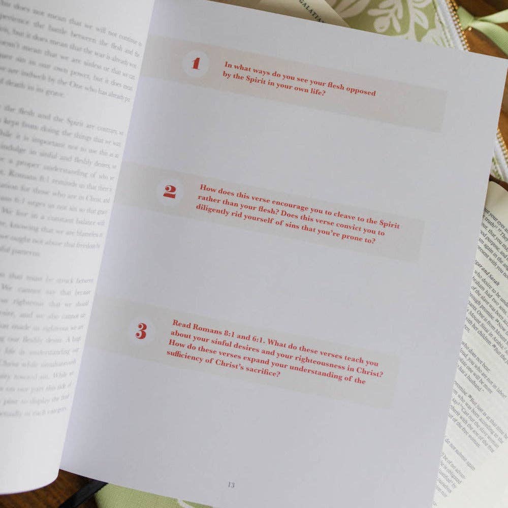 Open book with printed text on a table