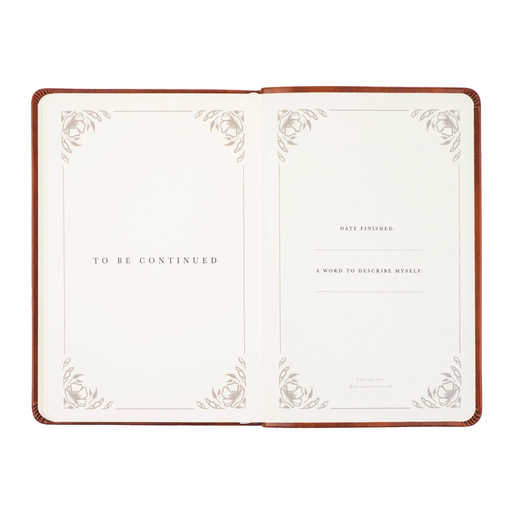 Open notebook with decorative pages and text on a white background